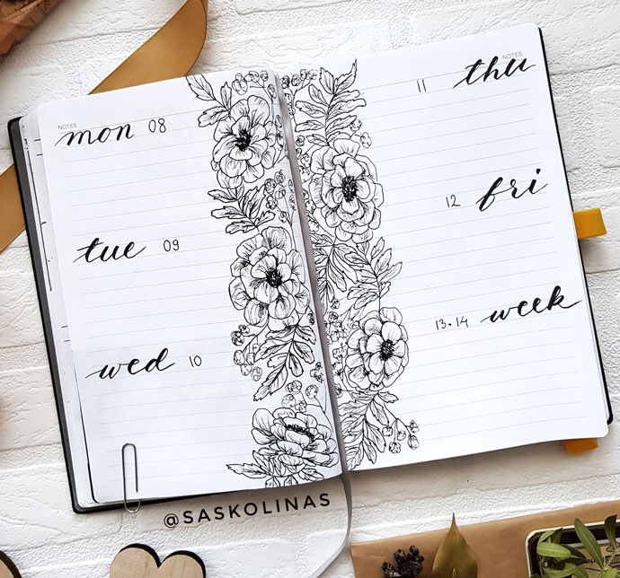 mirror bujo weekly layout with floral illustration in the centre
